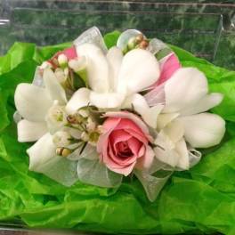 Pink rose bouquet with white calla lilies and ribbon wrap