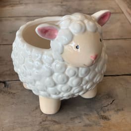 Ceramic sheep-shaped planter with pink ears and face