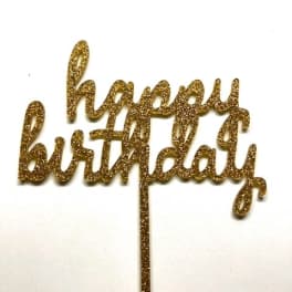 Gold glitter "happy birthday" cake topper on a white background