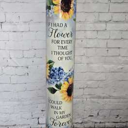 Tall sunflower-themed memorial cylinder with printed quote