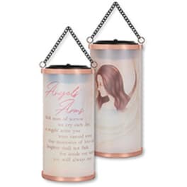 Two hanging memorial candles with a woman illustration and pink text