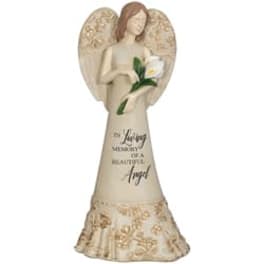 Angel figurine holding a white flower and memorial text
