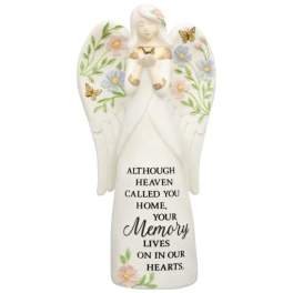 Angel figurine with floral accents and memorial text