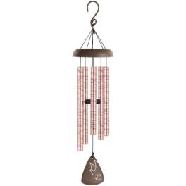 Brown wind chime with pink metal tubes and a dove-shaped pendant
