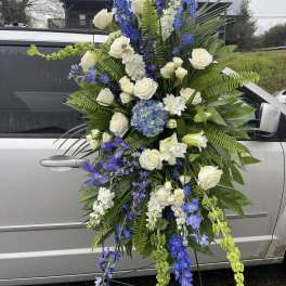 large sympathy spray white and blue