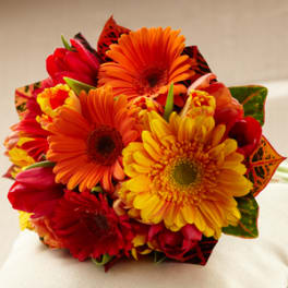 Bouquet of orange, yellow, and red gerbera daisies