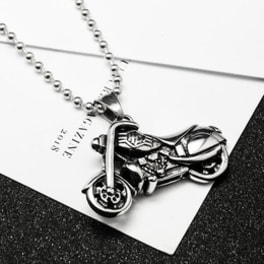 Silver motorcycle pendant necklace on a card