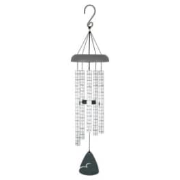 Hanging metal wind chime with a dark clapper