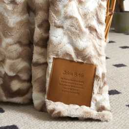 Faux fur blanket with a John 3:16 leather patch