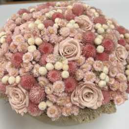 Round bouquet of blush and pink flowers with pale roses