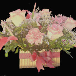 Low wooden box arrangement with pink roses, carnations, and mini calla lilies accented with small white blooms.