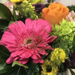 Bright mixed bouquet with a pink gerbera daisy and orange rose