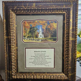 Framed memorial plaque with a church scene and poem for Uncle