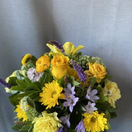 Yellow and lavender mixed bouquet with roses and daisies