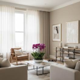 Potted purple orchids on a coffee table in a modern living room