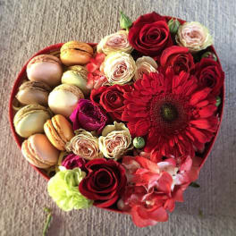 Heart-shaped box with roses, gerbera daisy, and macarons