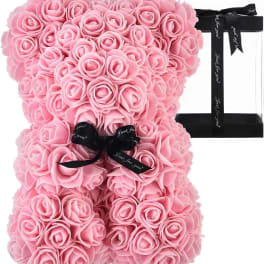 Pink rose teddy bear with a black ribbon bow