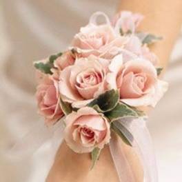 Pink rose wrist corsage with ribbon ties