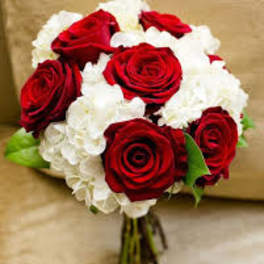 Bouquet of red roses and white hydrangeas