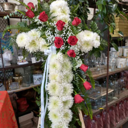 Standing floral cross with white chrysanthemums and red roses