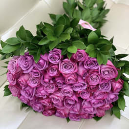 Bouquet of pink roses with green foliage