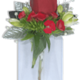 Single red rose with small red flowers and white buds in a tall glass vase with silver accents