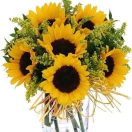 Bouquet of sunflowers in a clear glass vase