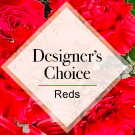 Graphic for a designer's choice red flower arrangement with red roses and carnations