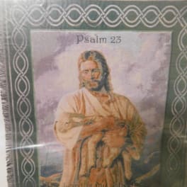Framed religious wall hanging with Psalm 23 and an image of Jesus
