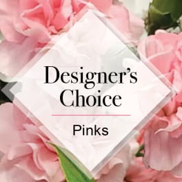 Designer’s choice pink floral theme with soft pink blossoms in the background