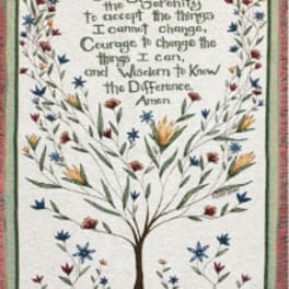 Framed floral wall hanging with a quote and a tree made of flowers