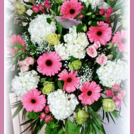 Pink gerbera and white hydrangea bouquet with roses