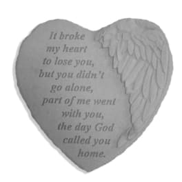 Heart-shaped memorial plaque with angel wings and a sympathy message