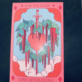 Illustrated card with a sword through a heart and hanging vines