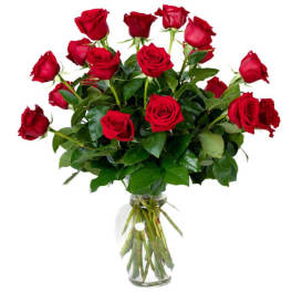 Tall arrangement of long-stemmed red roses in a clear glass vase