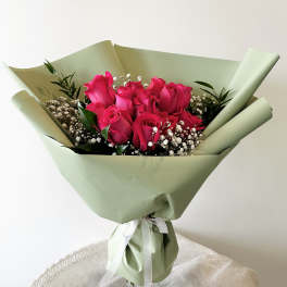 One Dozen Hot Pink Roses Hand Bouquet (Vase not included)