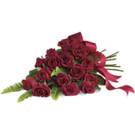 Bouquet of deep red roses with a ribbon bow