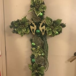 Green Christmas cross with gold ribbon and reindeer ornaments