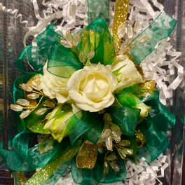 White rose bouquet with green and gold ribbon accents