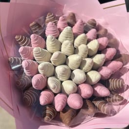 Bouquet of pink, white, and brown chocolate treats wrapped in pink paper