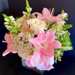 Pink lilies and white roses in a bouquet