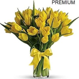 20 Yellow Tulips arranged in a vase