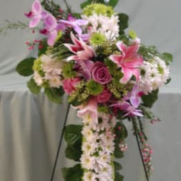Standing floral spray with pink lilies, orchids, roses, and white daisies