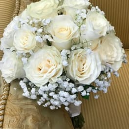 Bouquet of white roses with baby's breath