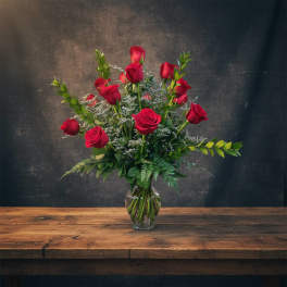 18 Red Roses With Caspia And Mixed Foliage