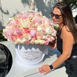 Large pastel flower box with pink and white blooms
