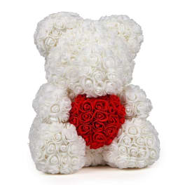 White rose teddy bear holding a red rose heart