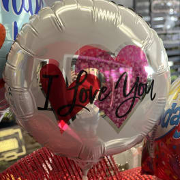 Heart-shaped balloon with "I Love You" text