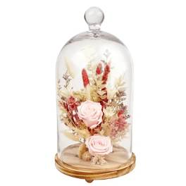 Two pale pink roses under a glass dome on a wooden base