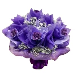 Purple rose bouquet with white filler flowers